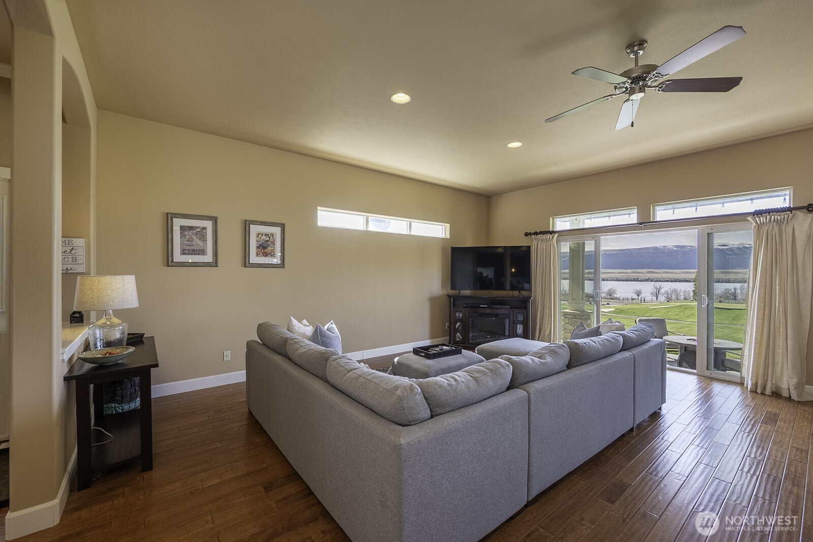 23466 Sunserra Loop Quincy, WA 98848 - Photo 19 of 40 a living room with furniture and a wooden floor