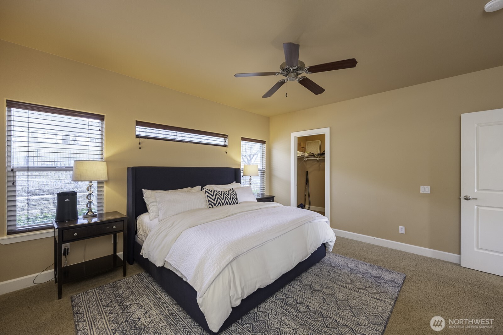 23466 Sunserra Loop Quincy, WA 98848 - Photo 22 of 40 a bedroom with a bed and wooden floor