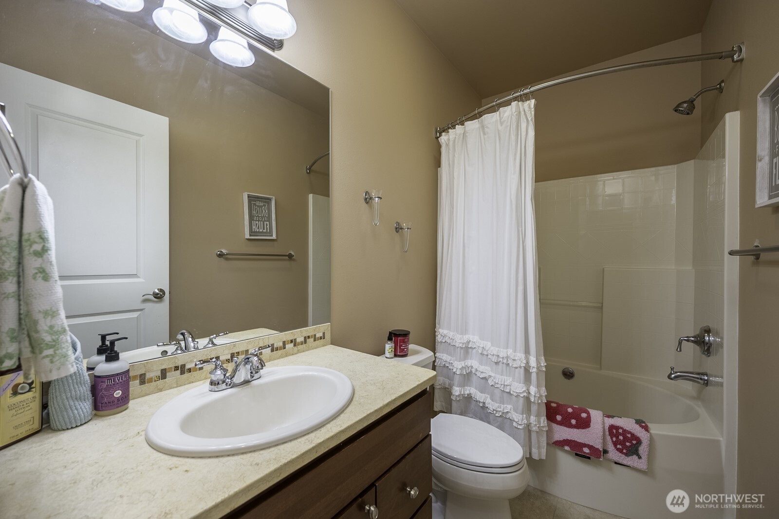 23466 Sunserra Loop Quincy, WA 98848 - Photo 29 of 40 a bathroom with a sink vanity mirror and toilet