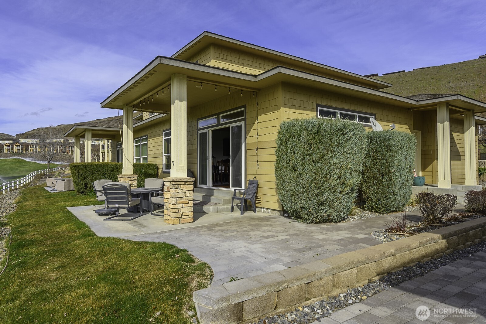 23466 Sunserra Loop Quincy, WA 98848 - Photo 5 of 40 a view of a chair and tables in the patio