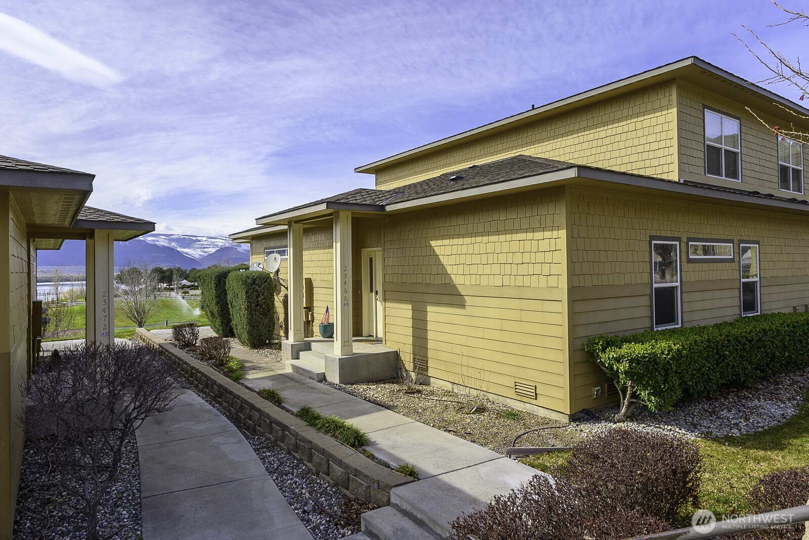 23466 Sunserra Loop Quincy, WA 98848 - Photo 6 of 40 a front view of a house with a yard
