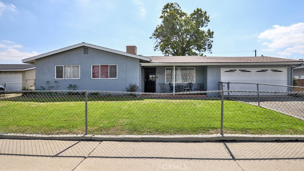 655 West Morgan Street Rialto, CA 92376 - Photo 1 of 1 a view of a house with a backyard