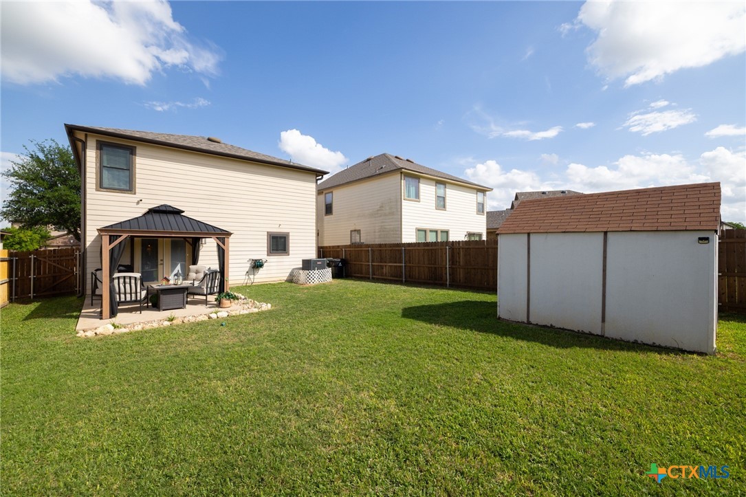 9142 Sage Loop Court Temple, TX 76502 - Photo 3 of 27 a view of a house with backyard and sitting area