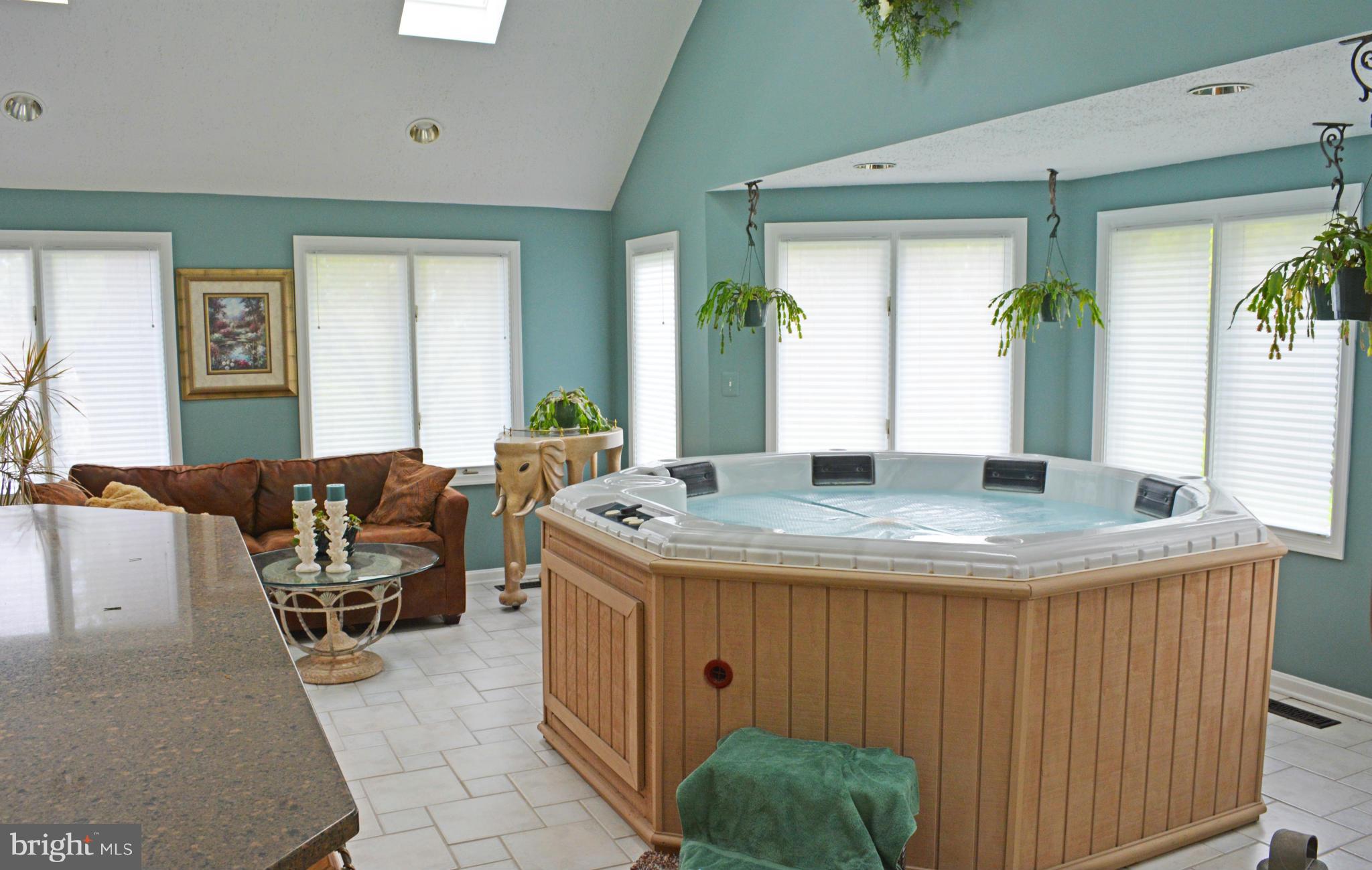 6001 Brooklyn Bridge Road Laurel, MD 20707 - Photo 13 of 28 Sun Room With Indoor Hot Tub