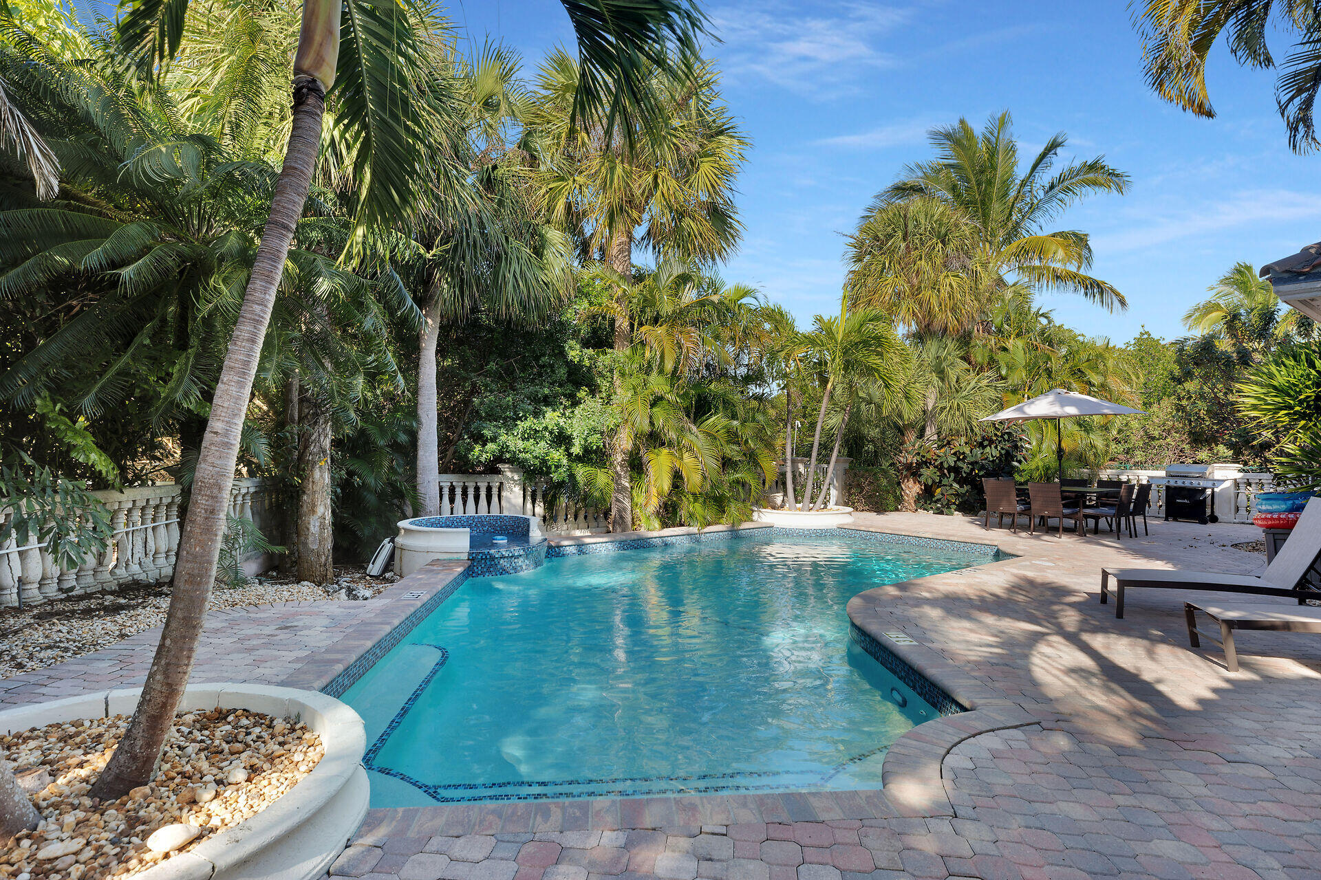 125 13th Street Key Colony Beach, FL 33051 - Photo 18 of 56 a view of a backyard
