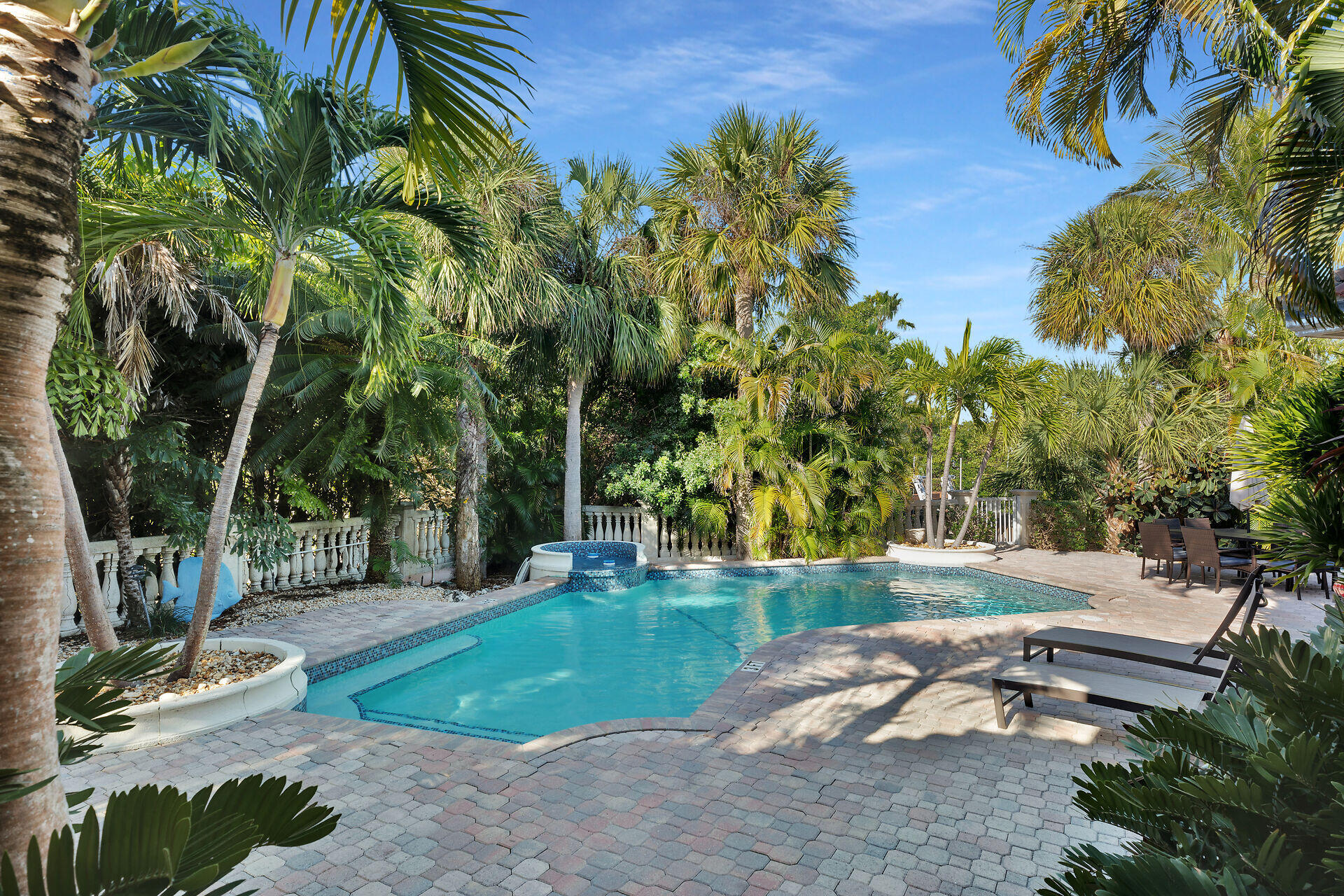 125 13th Street Key Colony Beach, FL 33051 - Photo 19 of 56 a view of a yard with plants and trees