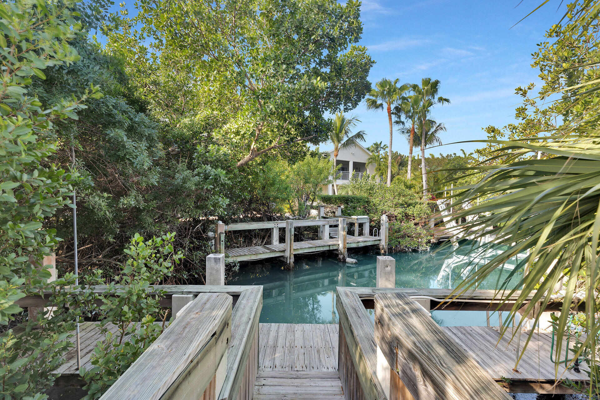 125 13th Street Key Colony Beach, FL 33051 - Photo 23 of 56 a view of balcony with outdoor space and trees