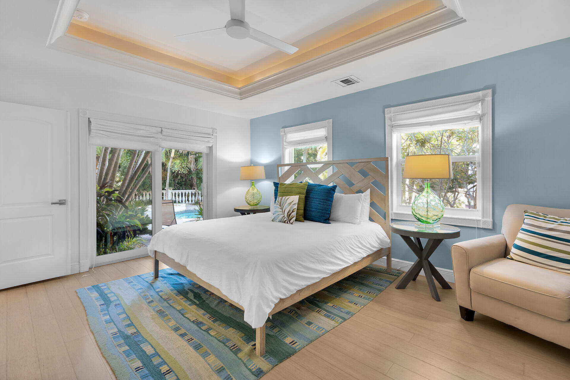 125 13th Street Key Colony Beach, FL 33051 - Photo 31 of 56 a bed sitting in a bedroom next to a window