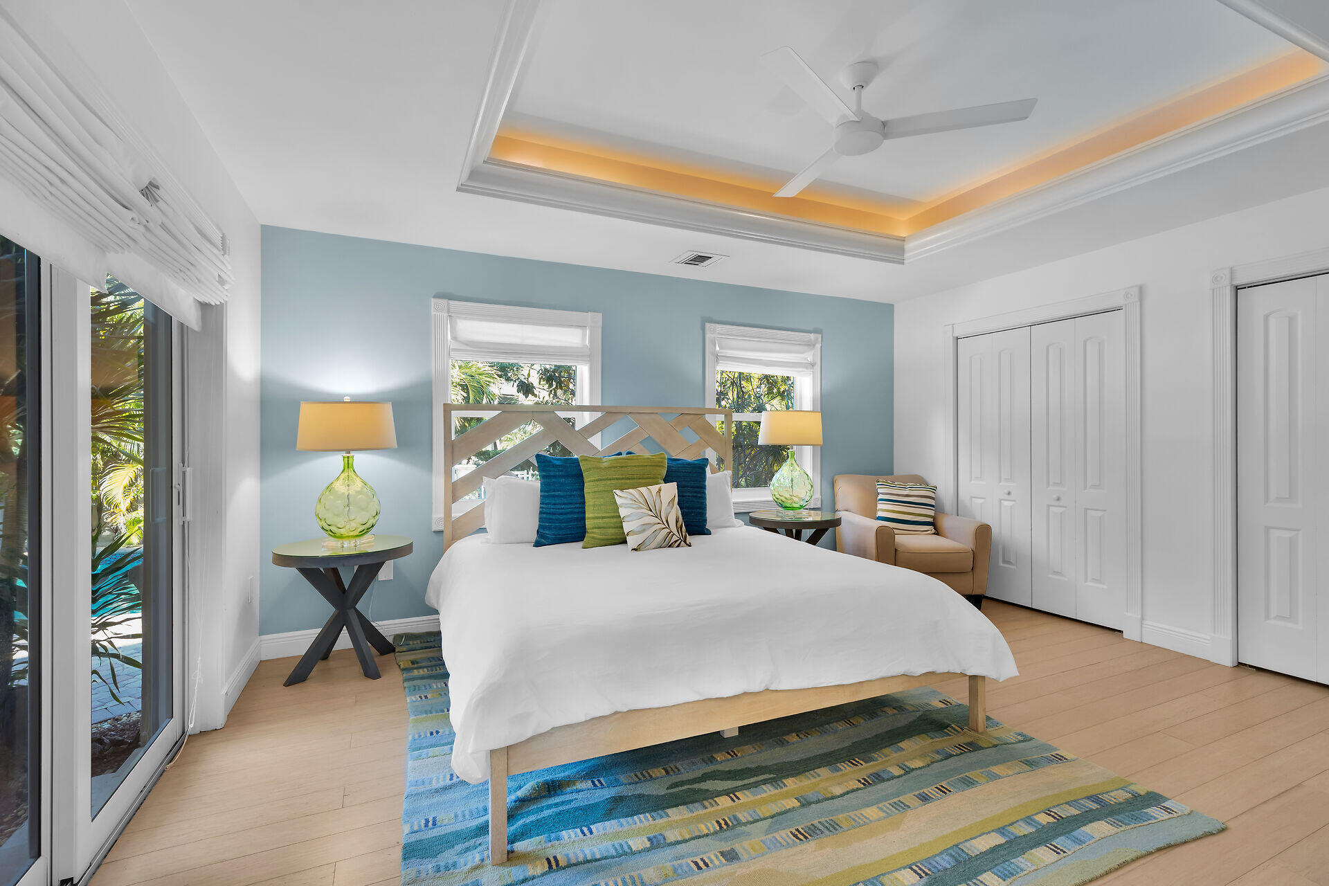 125 13th Street Key Colony Beach, FL 33051 - Photo 32 of 56 a bedroom with a bed and wooden floor