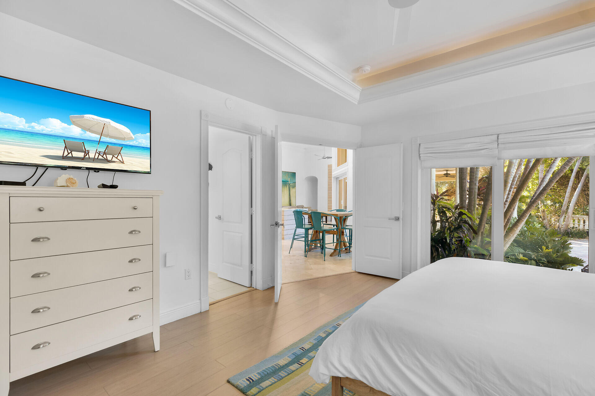 125 13th Street Key Colony Beach, FL 33051 - Photo 33 of 56 a bedroom with a bed and a dresser