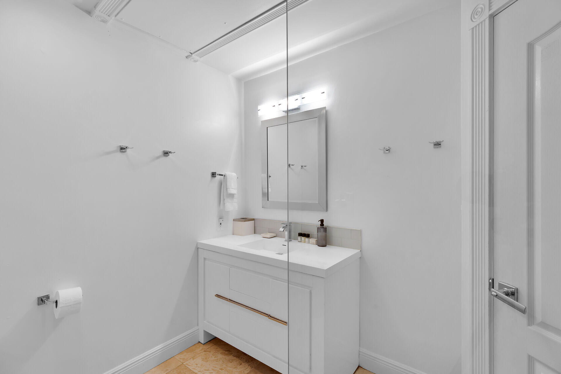 125 13th Street Key Colony Beach, FL 33051 - Photo 38 of 56 a bathroom with a sink a mirror and shower