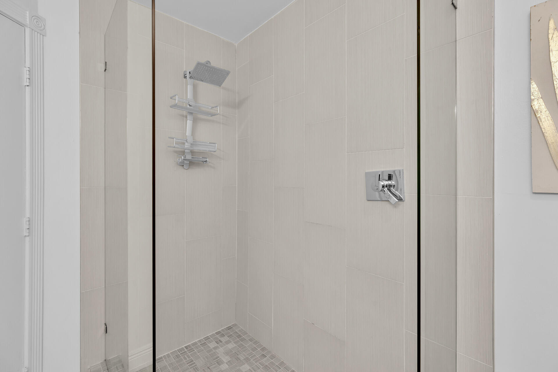 125 13th Street Key Colony Beach, FL 33051 - Photo 39 of 56 a bathroom with a glass shower door