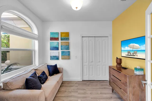 a utility room with cabinets dryer and washer