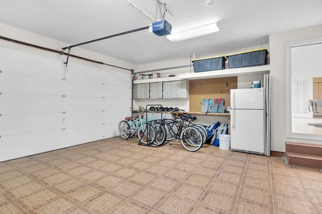 an aerial view of a house with a lake view