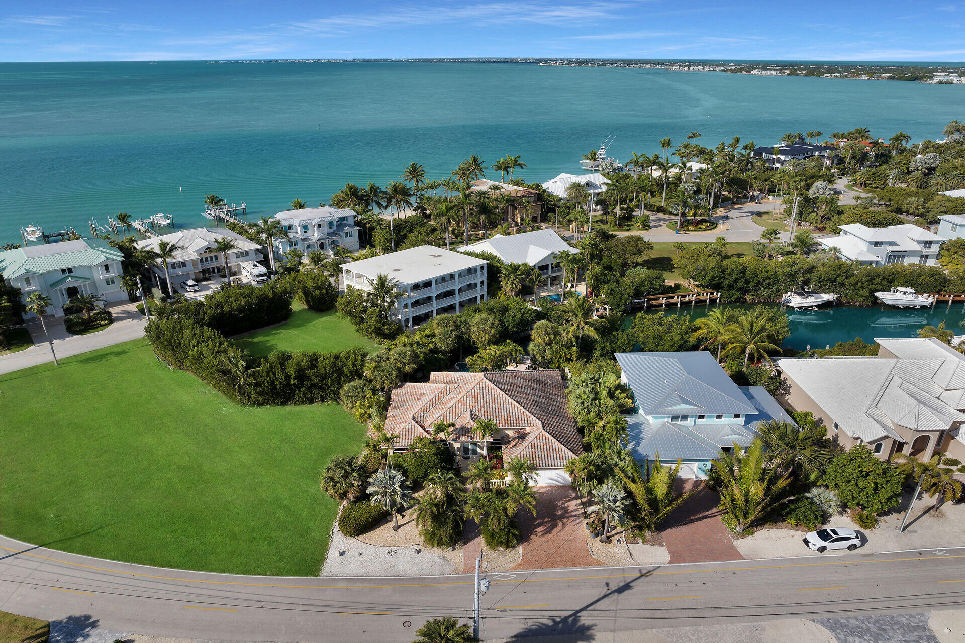 125 13th Street Key Colony Beach, FL 33051 - Photo 49 of 56 an aerial view of a house with a lake view