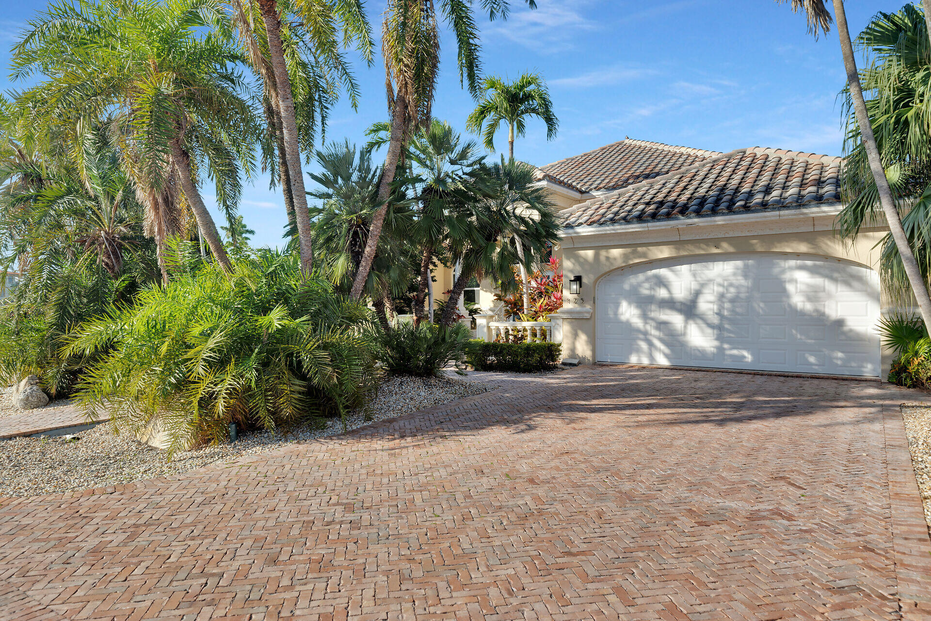 125 13th Street Key Colony Beach, FL 33051 - Photo 55 of 56 a view of a yard with potted plants