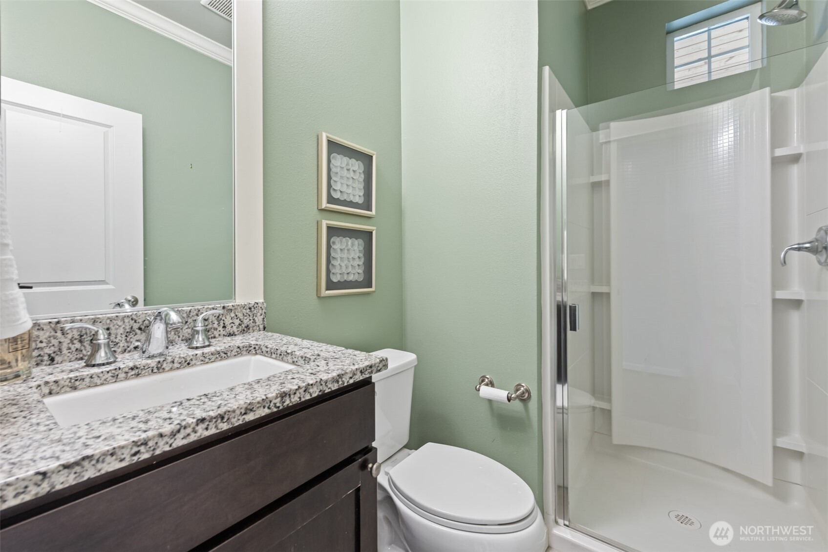 19420 109th Court Northeast Bothell, WA 98011 - Photo 14 of 35 a bathroom with a granite countertop sink mirror vanity and toilet