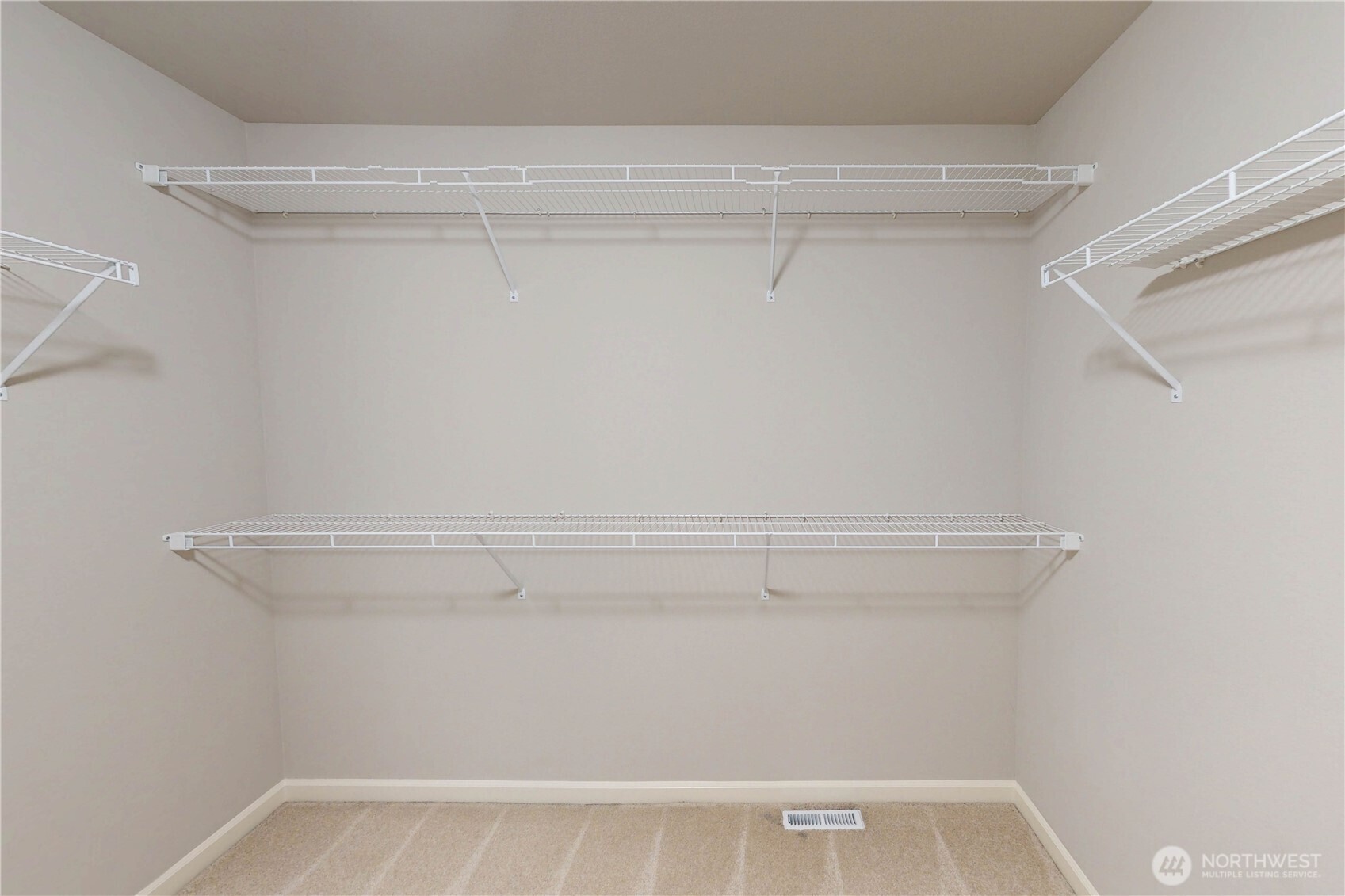 19420 109th Court Northeast Bothell, WA 98011 - Photo 19 of 35 a view of a room with racks on the wall