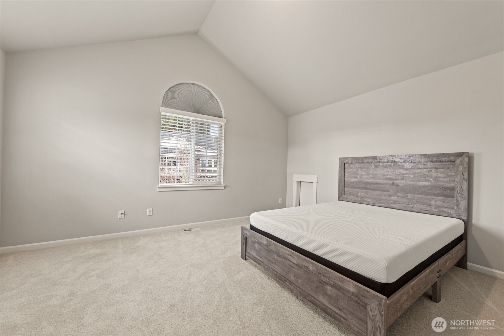 19420 109th Court Northeast Bothell, WA 98011 - Photo 20 of 35 a bedroom with a bed and window