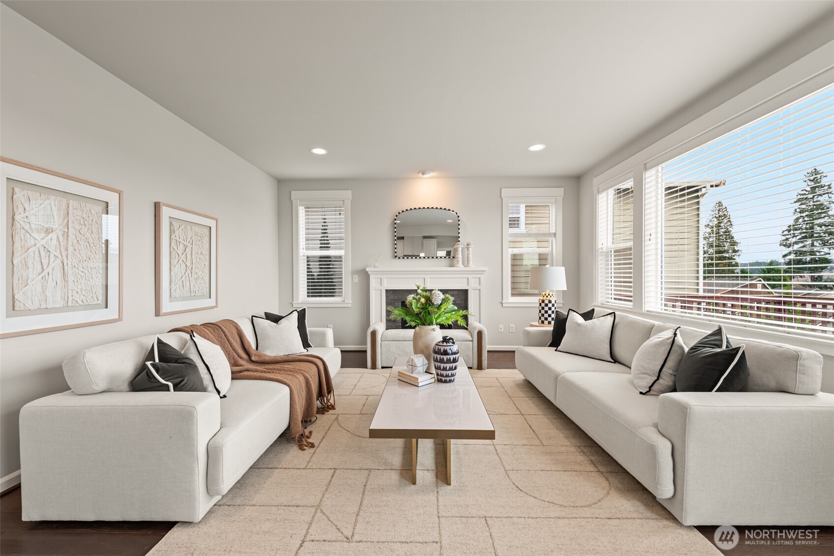 19420 109th Court Northeast Bothell, WA 98011 - Photo 2 of 35 a living room with furniture and a large window