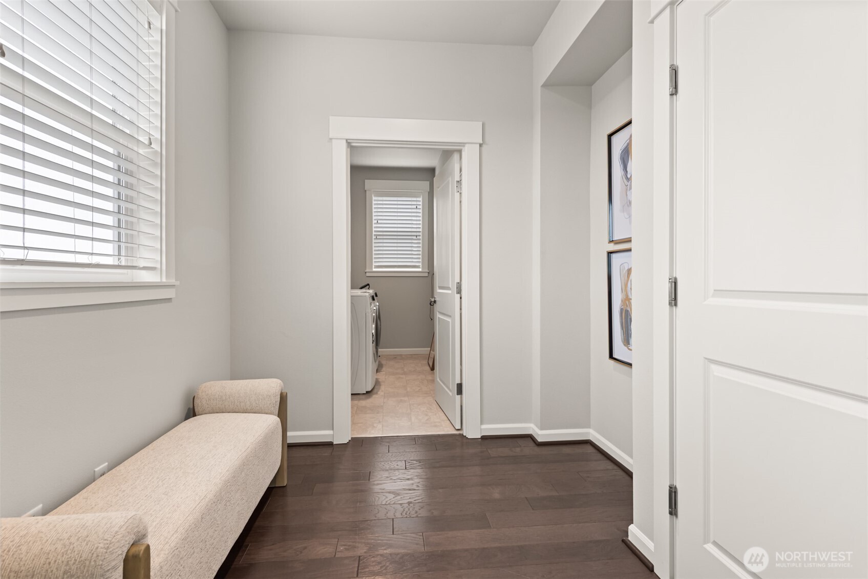 19420 109th Court Northeast Bothell, WA 98011 - Photo 10 of 35 a living room with a couch and a walk in closet