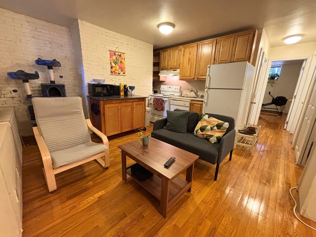 76 Tyler Street, Unit B1 Boston, MA 02111 - Photo 2 of 14