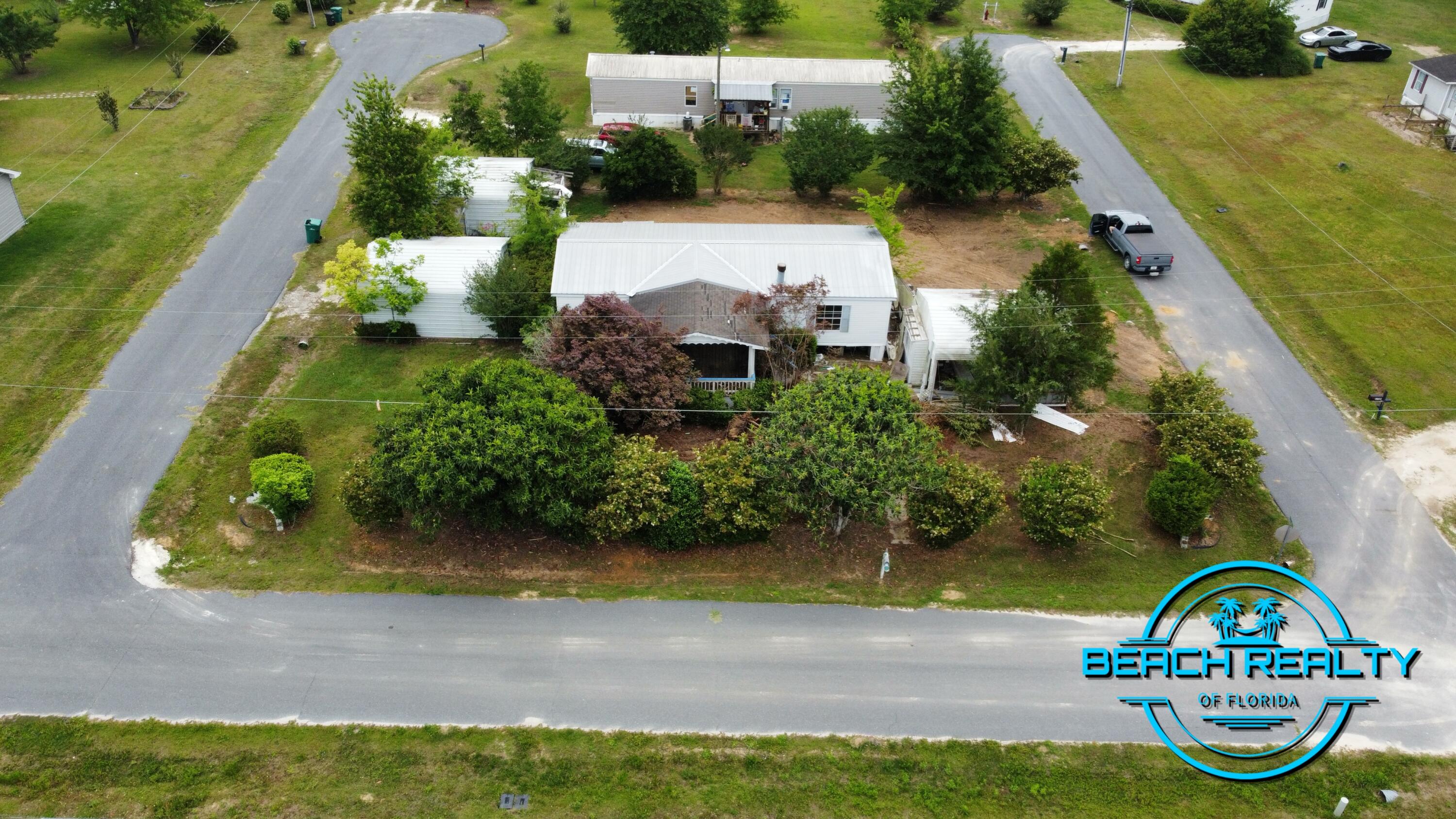 2128 Shadow Bay Avenue Grand Ridge, FL 32442 - Photo 1 of 9 FRONT TOP