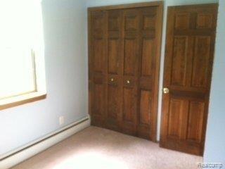 1554 Rochester Road Leonard, MI 48367 - Photo 5 of 17 Main Floor Bedroom