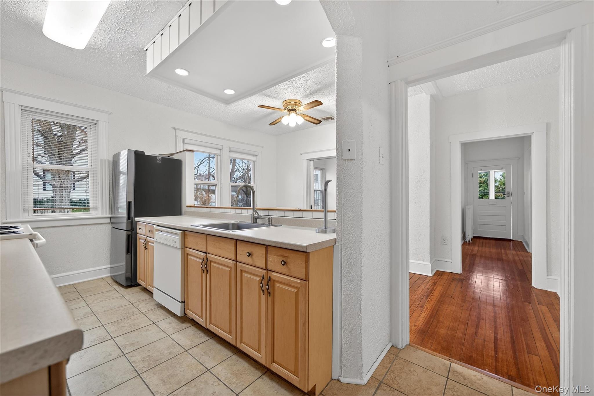 27 Algernon Street Cornwall, NY 12518 - Photo 14 of 41 a kitchen with stainless steel appliances granite countertop a refrigerator and a sink