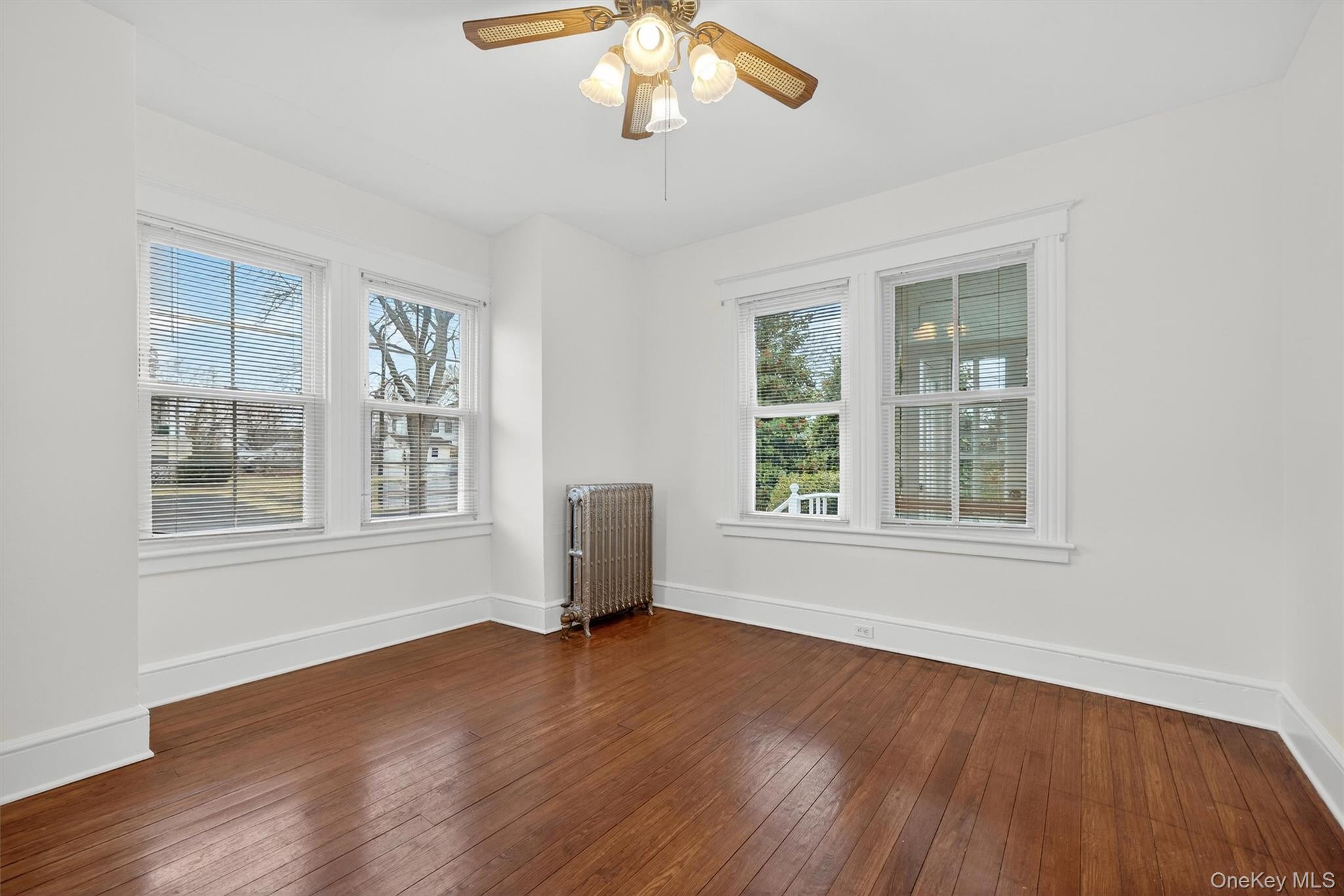 27 Algernon Street Cornwall, NY 12518 - Photo 23 of 41 a view of an empty room with wooden floor and a window