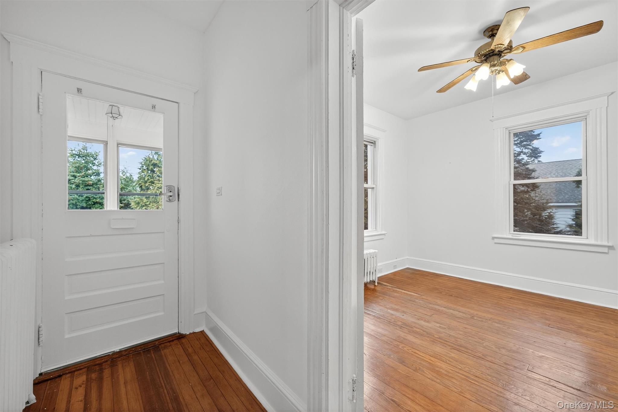 27 Algernon Street Cornwall, NY 12518 - Photo 6 of 41 a view of hallway with window and wooden floor
