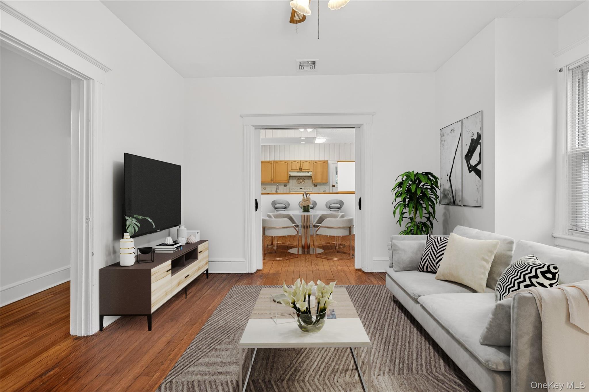 27 Algernon Street Cornwall, NY 12518 - Photo 9 of 41 a living room with furniture and a flat screen tv