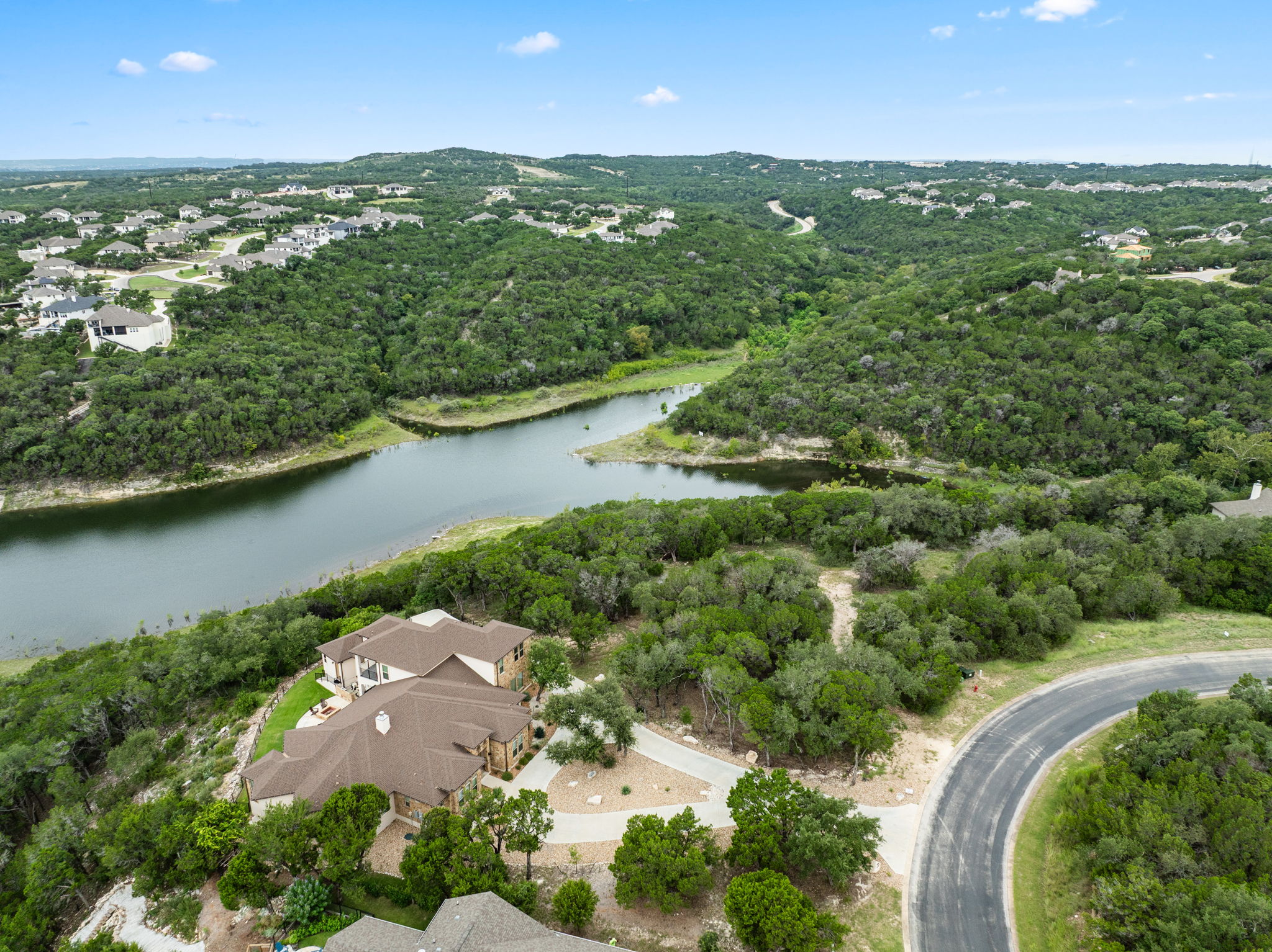 18821 Hidden Ridge Place Jonestown, TX 78645 - Photo 8 of 15 an aerial view of city and lake