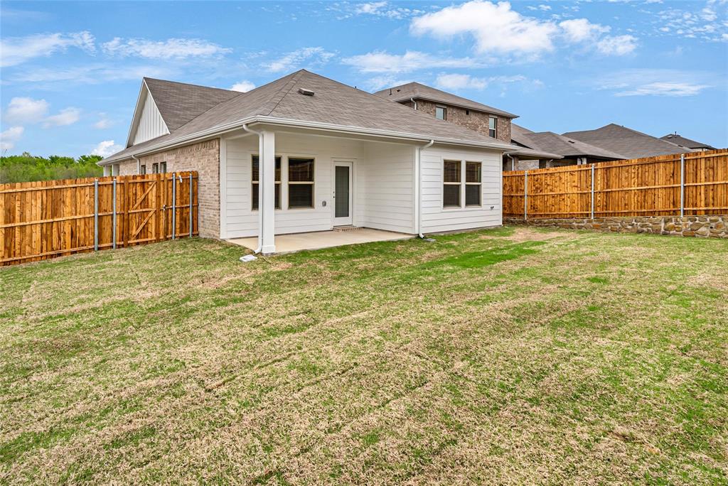 417 Martell Road Lowry Crossing, TX 75069 - Photo 29 of 29 a view of a yard in front of a house with a large tree