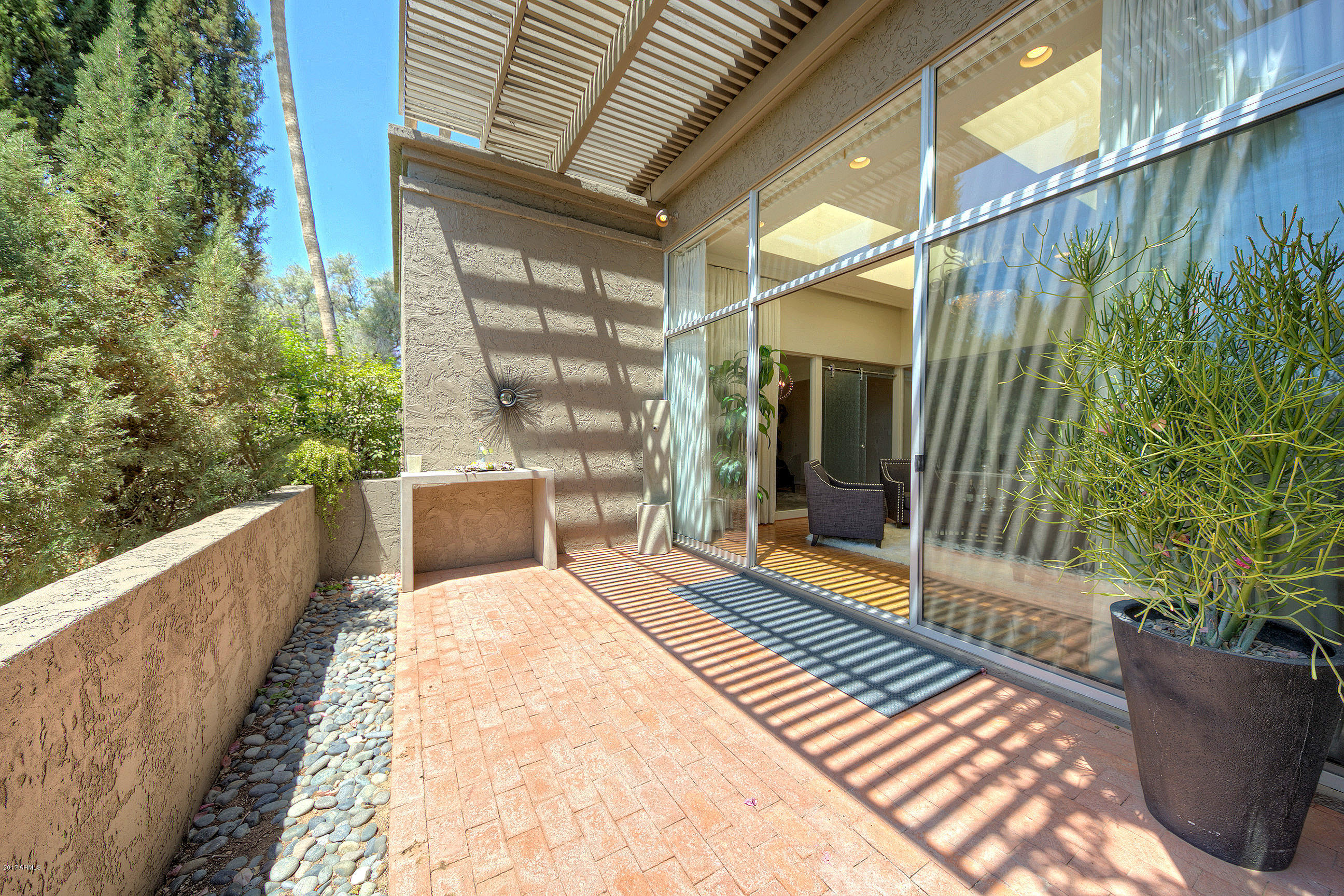 5666 North Scottsdale Road Paradise Valley, AZ 85253 - Photo 24 of 30 Rear patio with Floor to Ceiling Glass