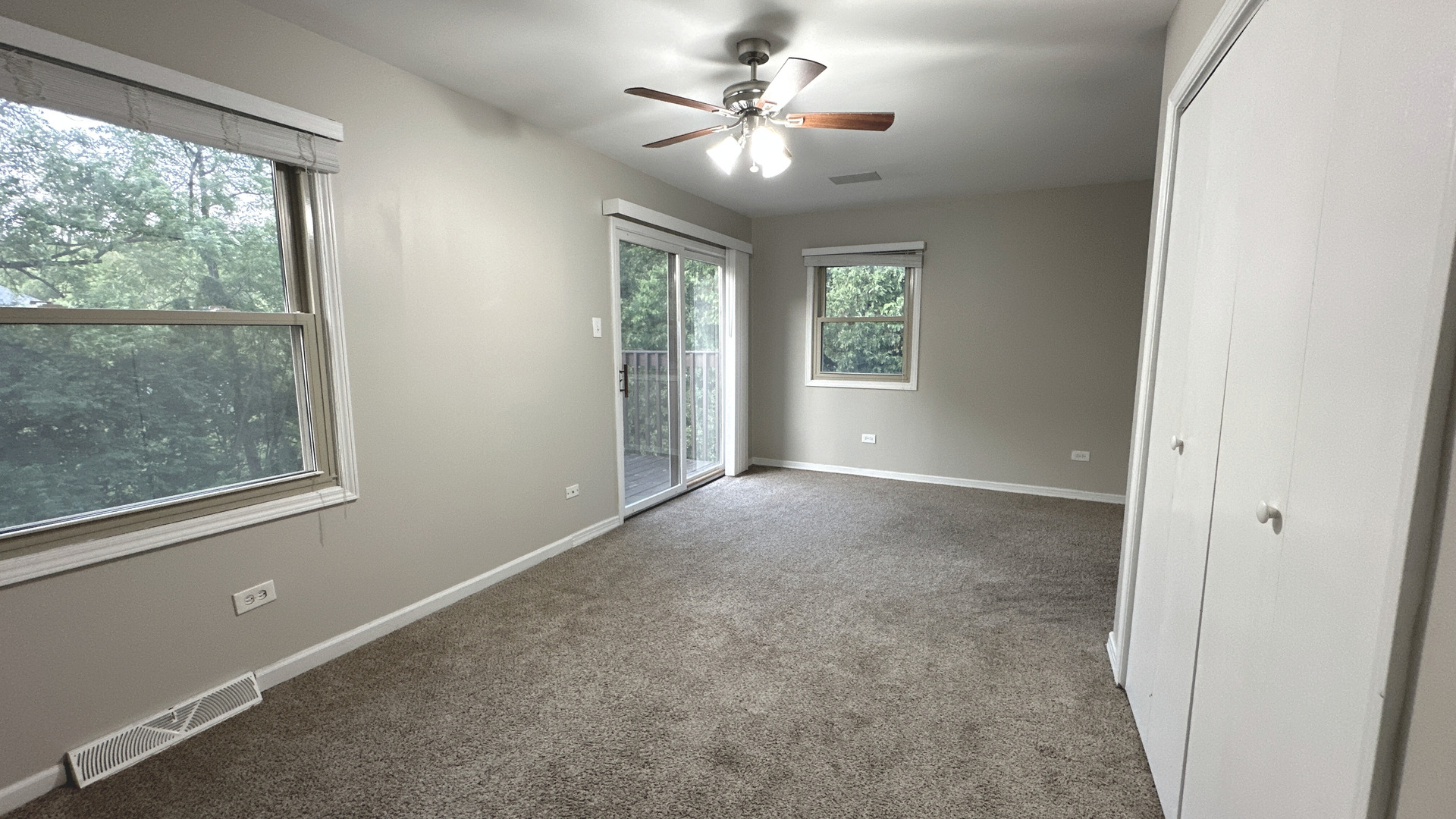 1607 Sylvan Court Flossmoor, IL 60422 - Photo 14 of 21 an empty room with windows and fan