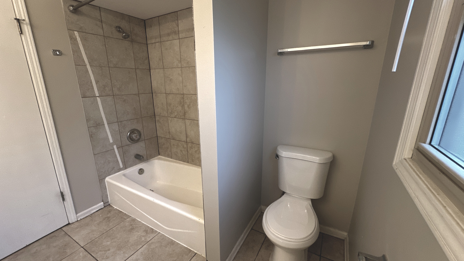 1607 Sylvan Court Flossmoor, IL 60422 - Photo 16 of 21 a white toilet sitting next to a bathtub