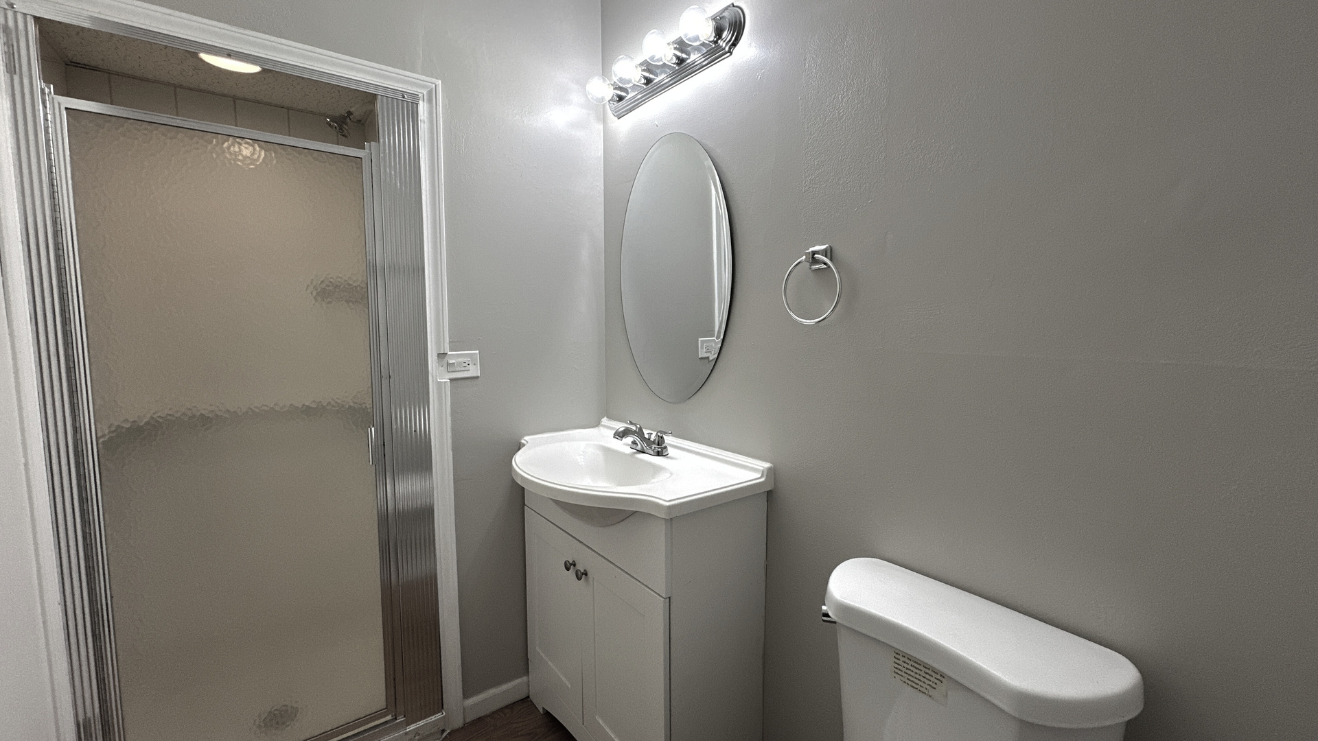 1607 Sylvan Court Flossmoor, IL 60422 - Photo 10 of 21 a bathroom with a toilet sink and mirror