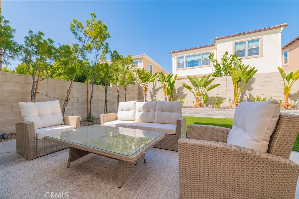 53 Lunar Irvine, CA 92618 - Photo 19 of 21 a outdoor living space with furniture and a potted plant