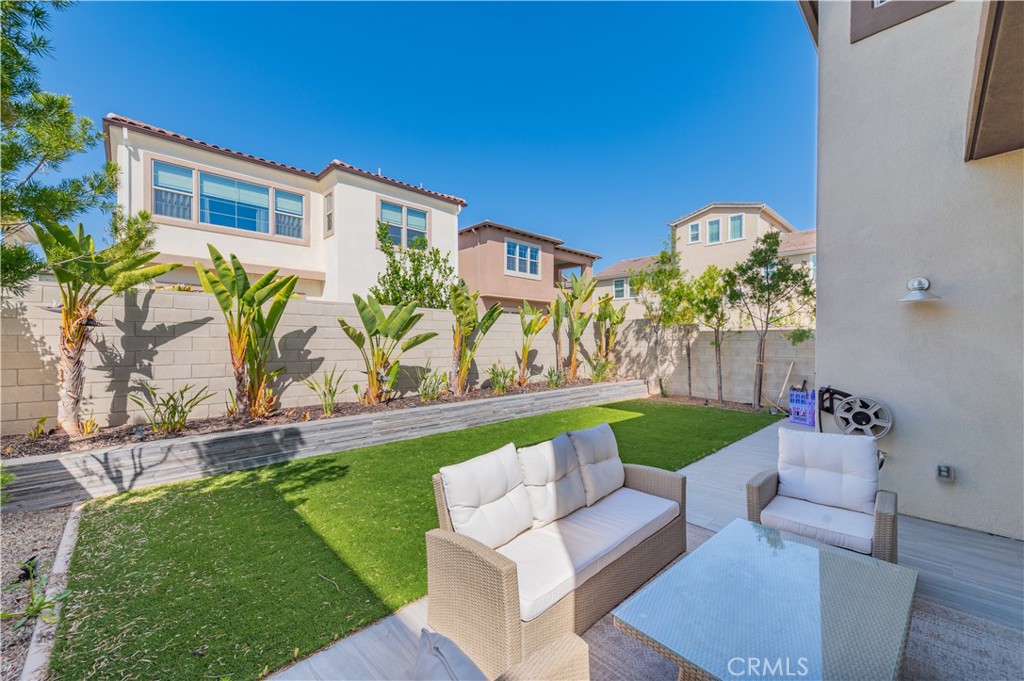 53 Lunar Irvine, CA 92618 - Photo 20 of 21 a front view of a house with garden