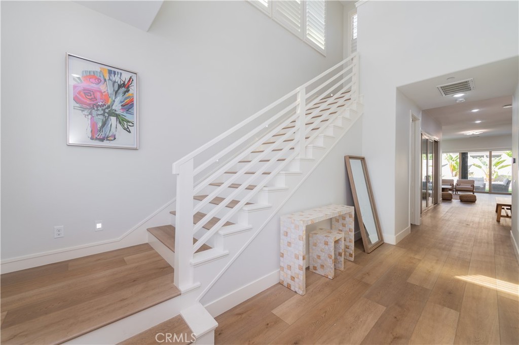 53 Lunar Irvine, CA 92618 - Photo 2 of 21 a view of entryway with furniture and wooden floor