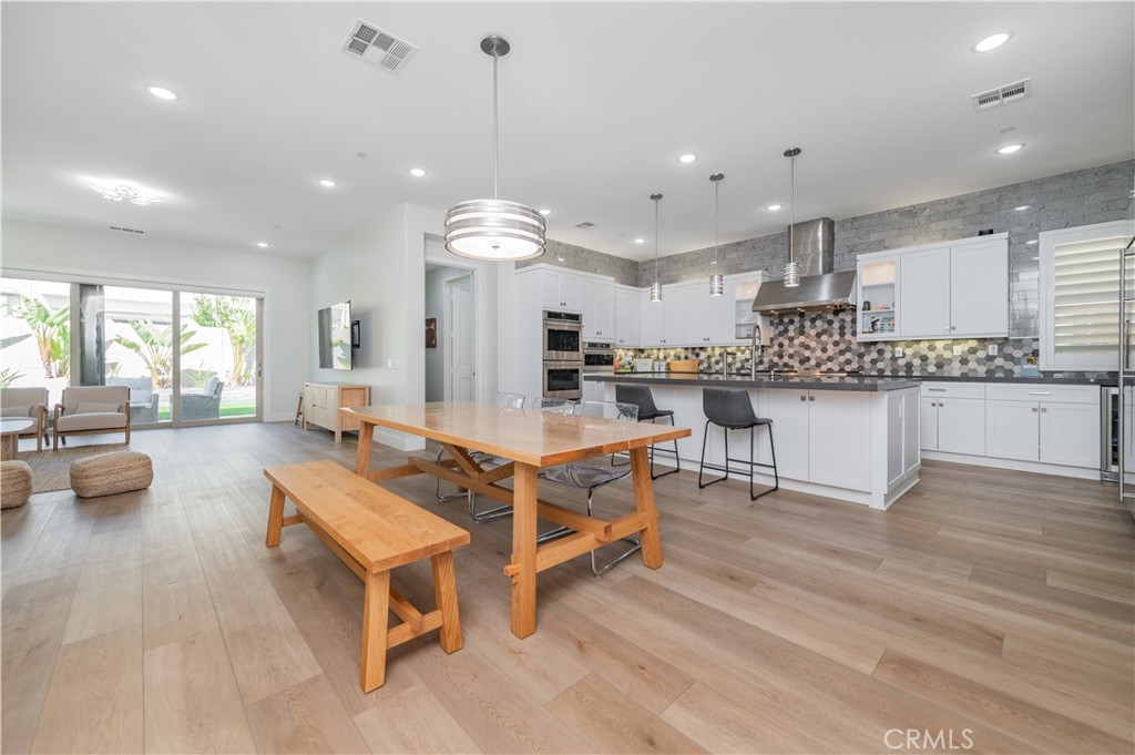 53 Lunar Irvine, CA 92618 - Photo 4 of 21 a living room with lots of furniture and kitchen view