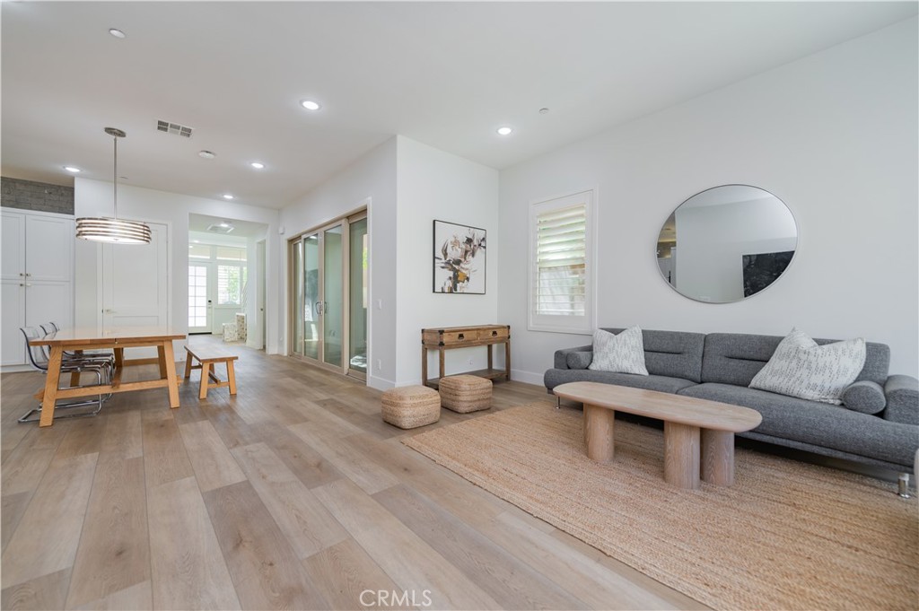 53 Lunar Irvine, CA 92618 - Photo 8 of 21 a living room with furniture and a large window