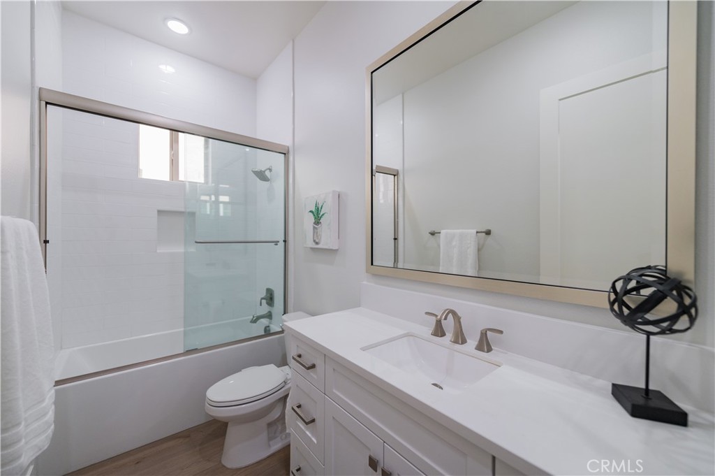 53 Lunar Irvine, CA 92618 - Photo 10 of 21 a bathroom with a sink a toilet and shower