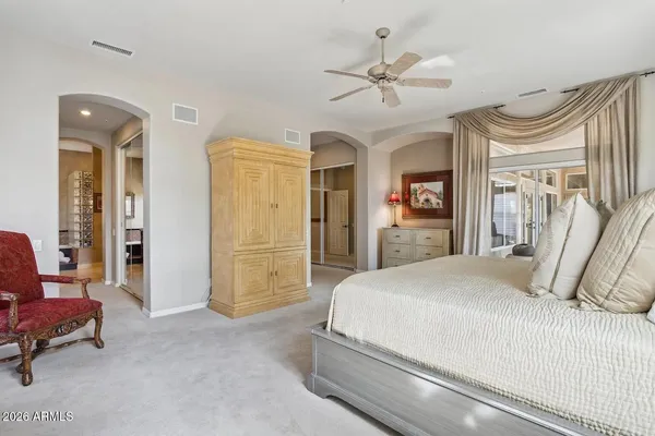 a living room with stainless steel appliances kitchen island granite countertop furniture and a kitchen view