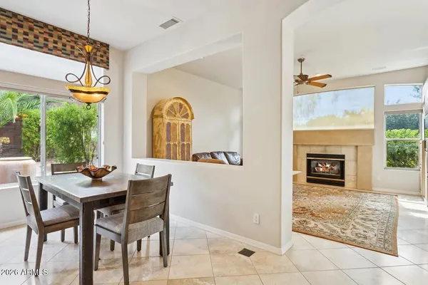 a bedroom with a bed and a fireplace