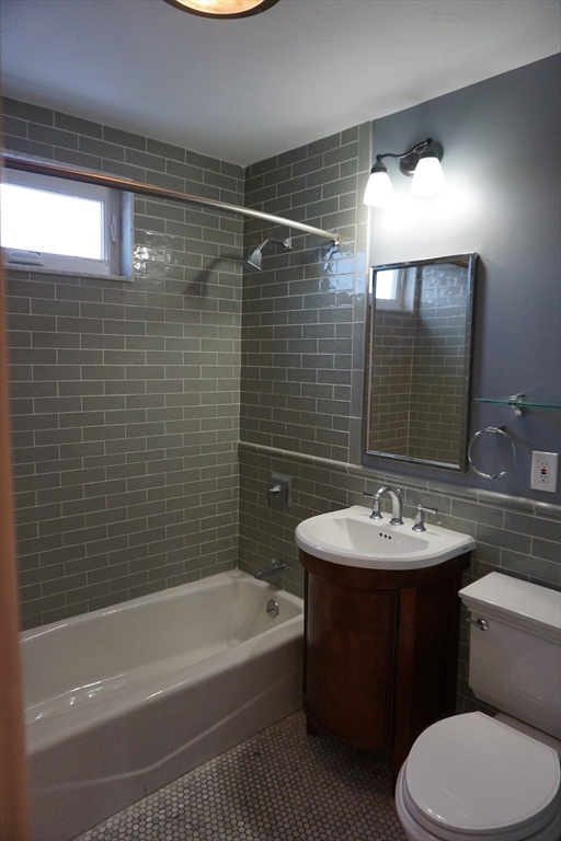 2 Littleton Road, Unit 3 Harvard, MA 01451 - Photo 13 of 19 a bathroom with a sink toilet and shower