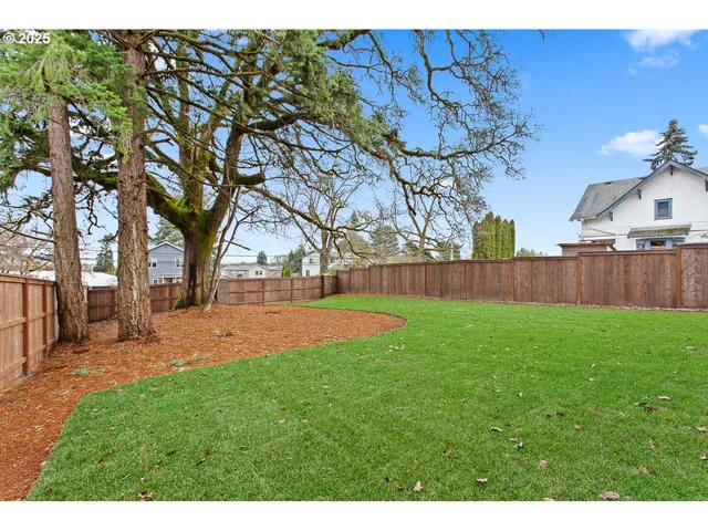 a view of yard with tree s