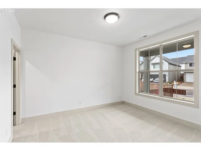 a big room with closet and mirror