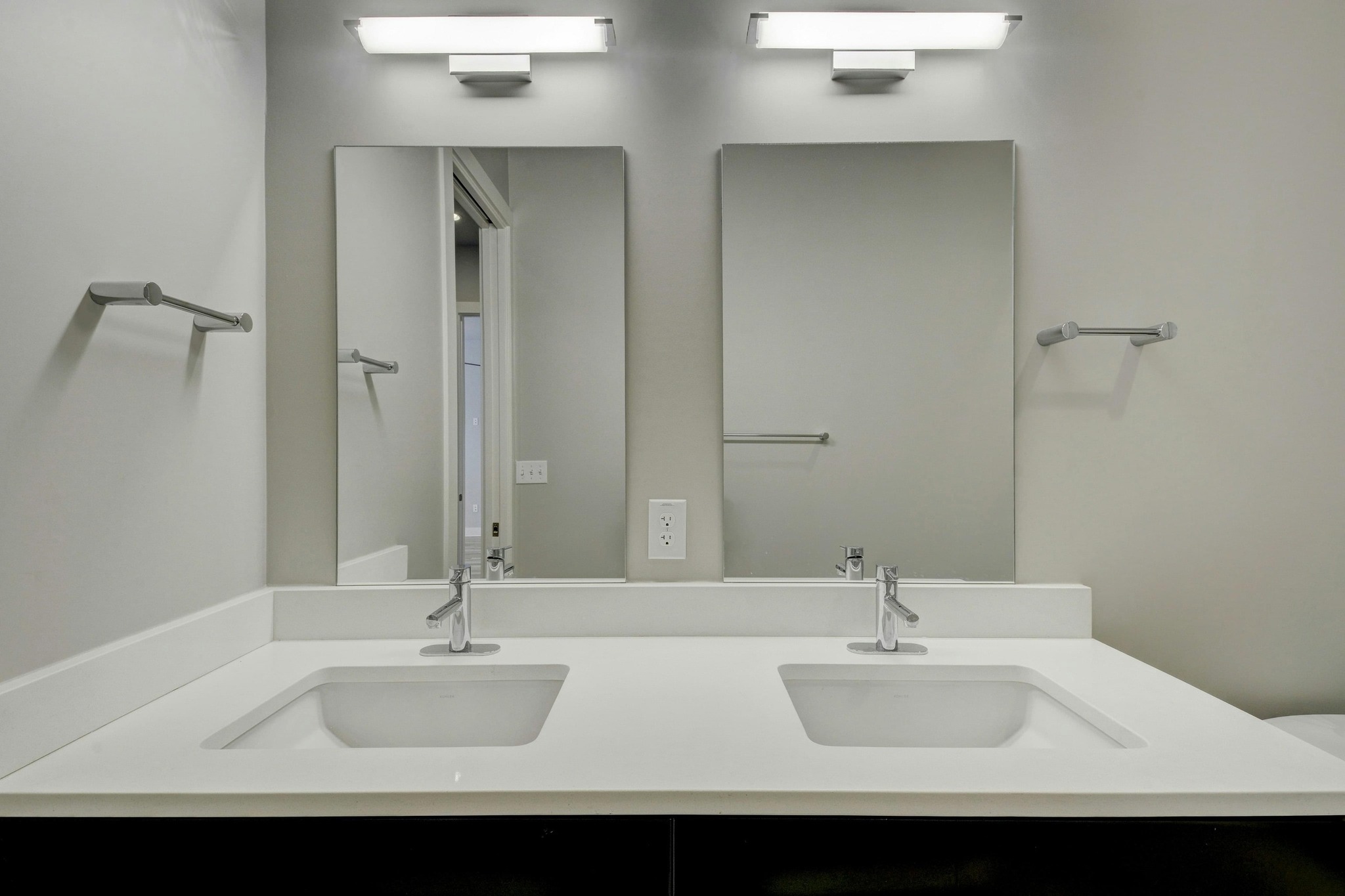 2314 Enfield Road, Unit 202 Austin, TX 78703 - Photo 11 of 20 Double vanities with clean, white countertops offer optimal functionality.